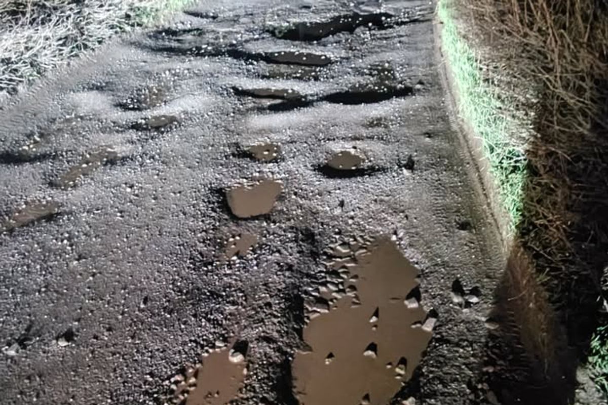 Potholes on the main road in a Devon village are 'an absolute nightmare'