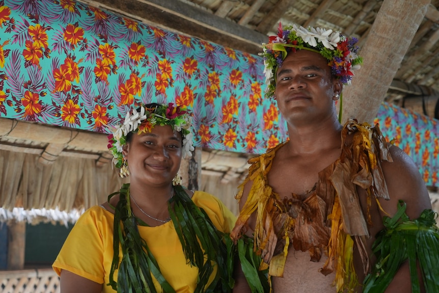 Taitaifono Lokisae (left) with another participant of the Fatele.