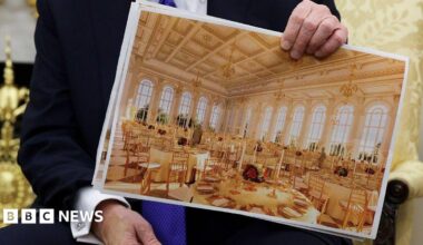 US President Donald Trump displays a rendering of his proposed $250 million White House ballroom as he meets with NATO Secretary General Mark Rutte in the Oval Office of the White House on 22 October 2025.