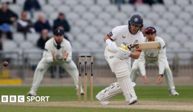 Marcus Harris clips the ball square on the on side and begins to run, wearing blue helmet with red rose emblem. Two opposition fielders are seen fielding in the slips behind him