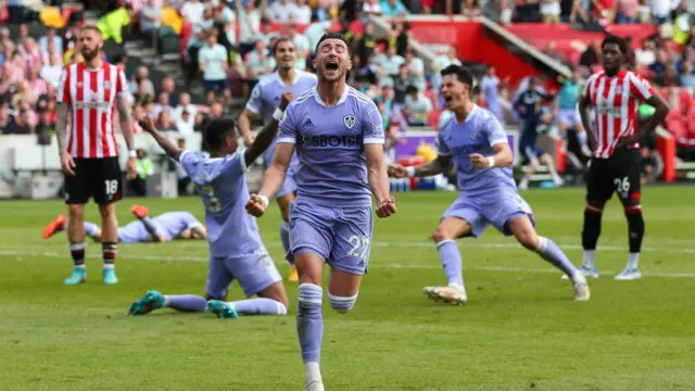 Jack Harrison celebrates