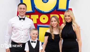 The family lined up for a photo in their formal clothes