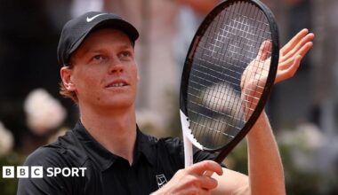 Jannik Sinner applauds the crowd after reaching the Italian Open semi-finals