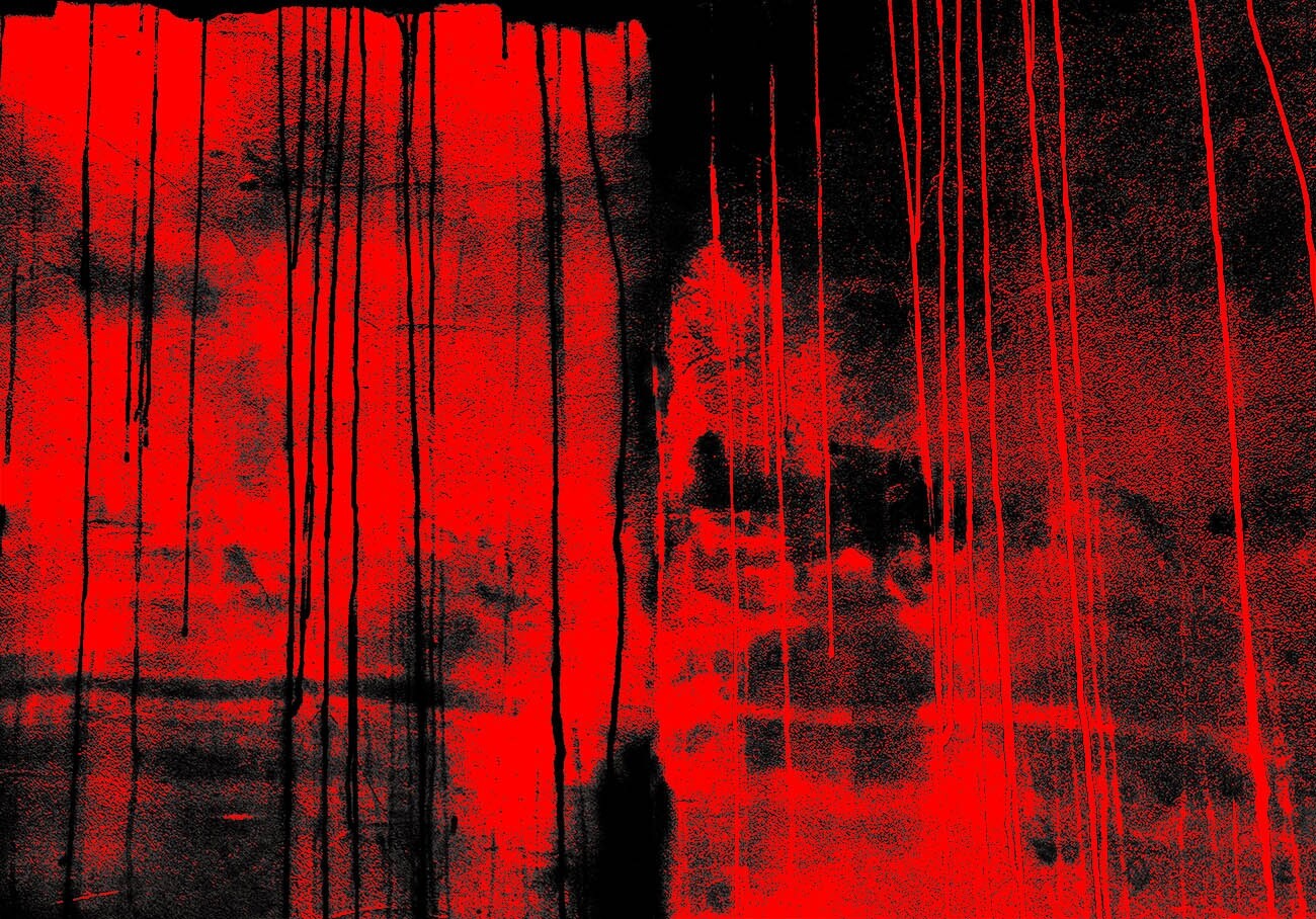 An abstract, high-contrast composition of bright red paint dripping down a dark, textured wall, creating a stark and gritty vertical pattern.