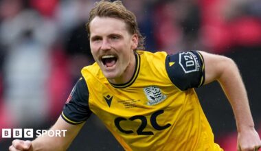 Gus Scott-Morriss celebrates scoring the winning penalty in the shootout against Wealdstone in the FA Trophy final