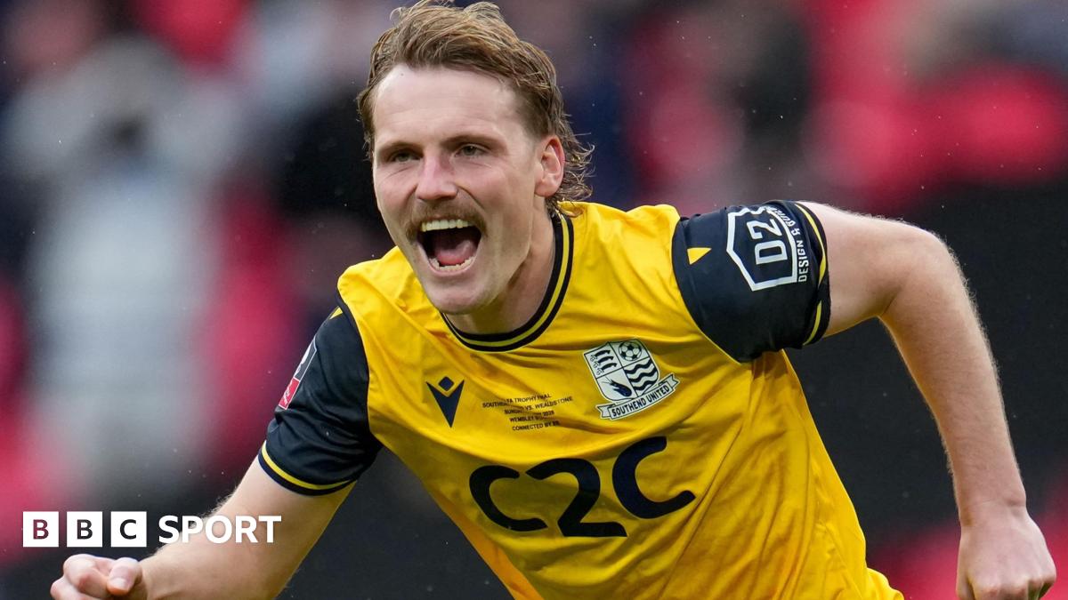 Gus Scott-Morriss celebrates scoring the winning penalty in the shootout against Wealdstone in the FA Trophy final