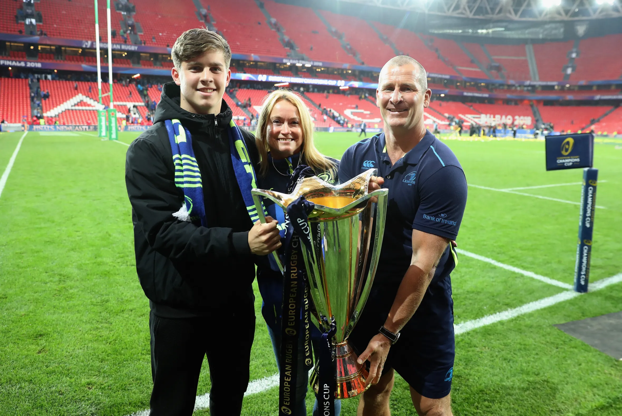 Stuart Lancaster, his wife Nina, and son Daniel celebrating with the European Rugby Champions Cup.