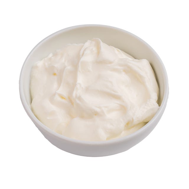 Healthy Fresh greek yogurt in a bowl isoalted on white background. top view healthy fresh greek yogurt in a bowl isoalted on white background. top view.