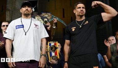 Oleksandr Usyk and Rico Verhoeven pose at the weigh-in
