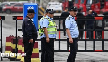 Police guard the road outside the Liushenyu coal mine, where an explosion killed dozens in Qinyuan county, in China's northern Shanxi province on May 24, 2026.