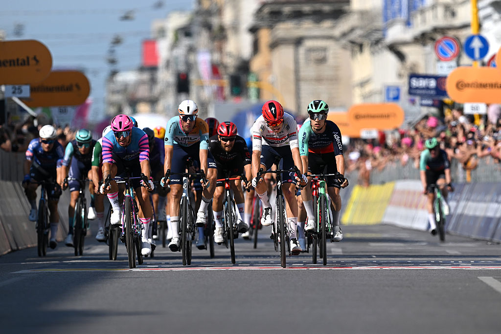MILAN, ITALY - MAY 24: (L-R) Dylan Groenewegen of Netherlands and Team Unibet Rose Rockets, Ethan Vernon of Great Britain and Team NSN Cycling, Paul Magnier of France and Team Soudal Quick-Step and Tobias Lund Andresen of Denmark and Team Decathlon CMA CGM cross the finish line during the 109th Giro d&amp;apos;Italia 2026, Stage 15 a 157km stage from Voghera to Milan / #UCIWT / on May 24, 2026 in Milan, Italy. (Photo by Tim de Waele/Getty Images)