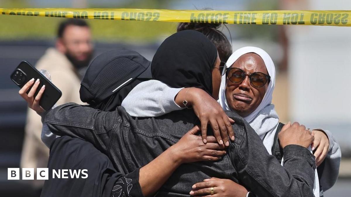 Members of the Muslim community in San Diego react after shooting at their mosque on 18 May 2026