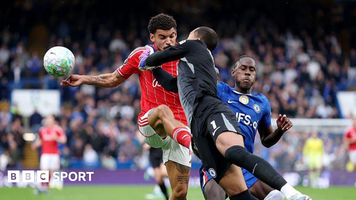 Nottingham Forest's Morgan Gibbs-White and Chelsea goalkeeper Robert Sanchez collide while going for the ball