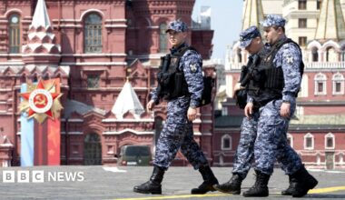 A Victory Day sign is seen in the middle of Red Square in Moscow