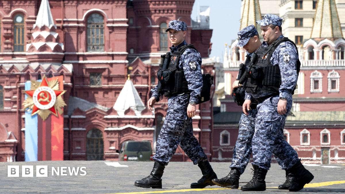 A Victory Day sign is seen in the middle of Red Square in Moscow