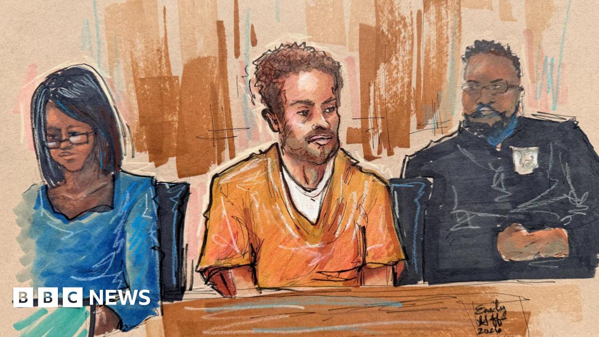 A 30 April 2026 courtroom sketch of Cole Tomas Allen, the suspect in the White House Correspondents' Dinner shooting, depicts him sitting in a courtroom in an orange jumper during a hearing after being charged with attempting to assassinate US President Donald Trump, in Washington DC.