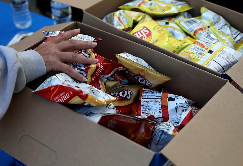 Eating chips or even healthy carbohydrates right before bed can spike your blood sugar levels, raising your risk for obesity and diabetes (Getty)