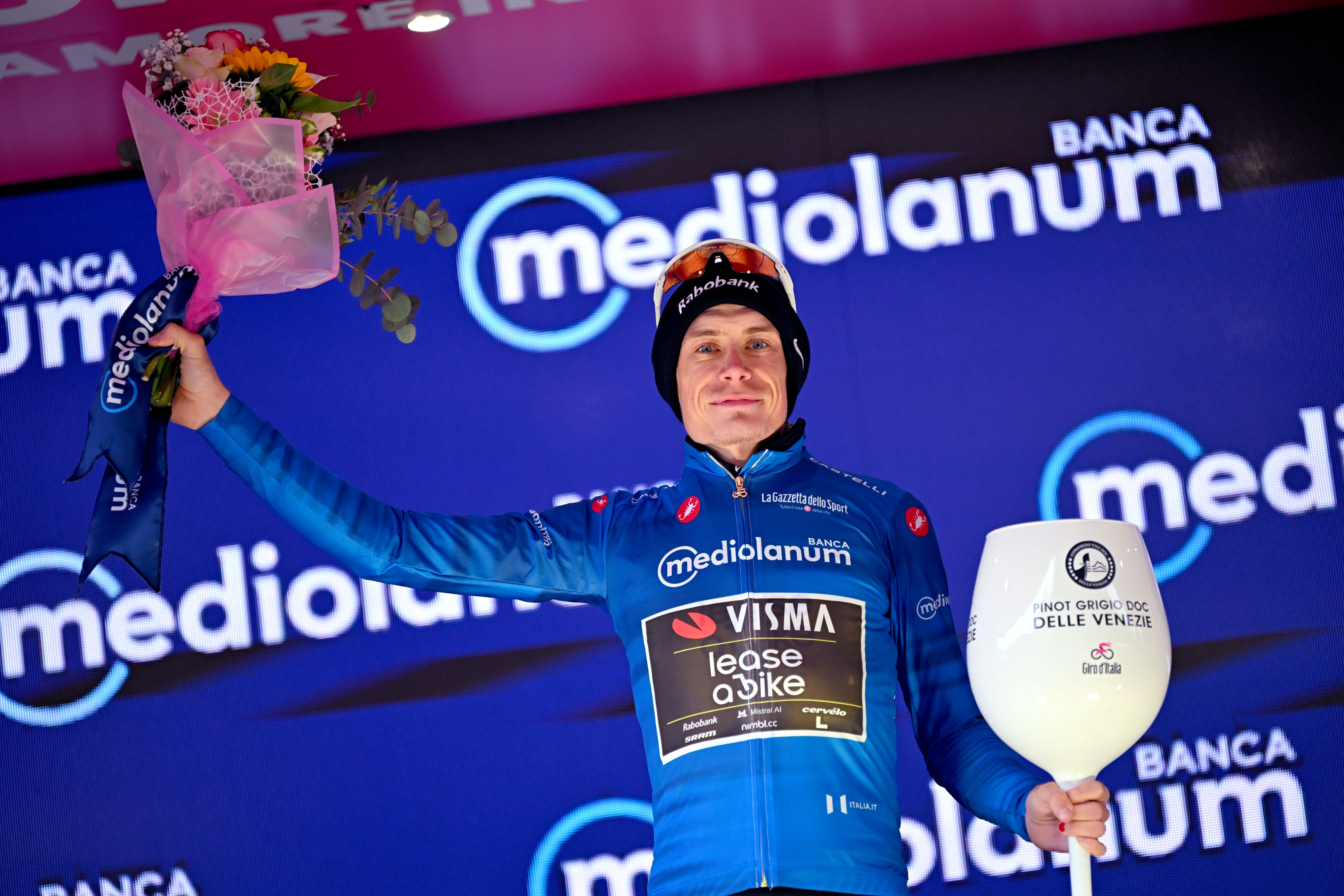 CORNO ALLE SCALE, ITALY - MAY 17: Jonas Vingegaard of Denmark and Team Visma | Lease a Bike celebrates at podium as Blue Mountain Jersey winner during the 109th Giro d'Italia 2026, Stage 9 a 184km stage from Cervia to Corno alle Scale 1469m / #UCIWT / on May 17, 2026 in Corno alle Scale, Italy. (Photo by Tim de Waele/Getty Images)