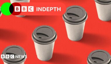 A coffee in a mug, with an imprint of Donald Trump in the foam
