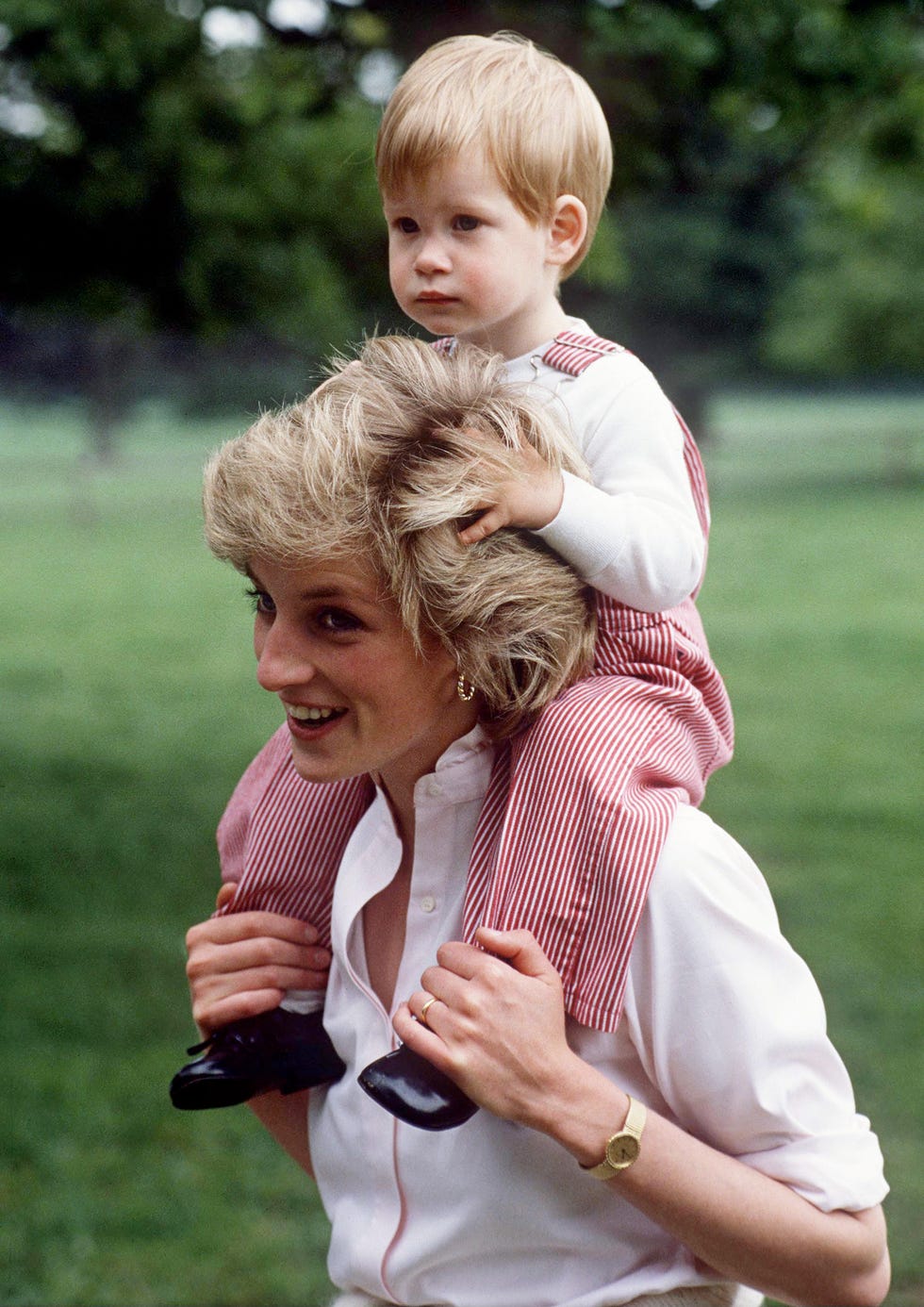tetbury, united kingdom july 18: princess diana carries prince henry (harry) on her shoulders at highgrove. (photo by tim graham photo library via getty images)