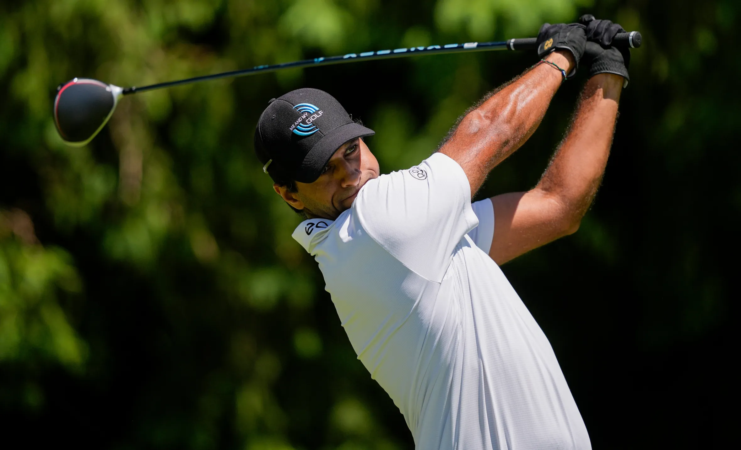 Aaron Rai of England hitting a golf ball during the PGA Championship.