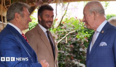 King Charles III and Queen Camilla, watched by Sir David Beckham (right) view the RHS and The King's Foundation Curious Garden