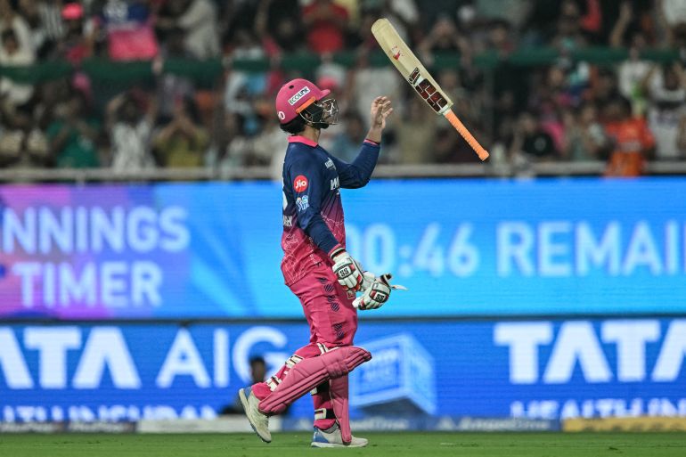 Rajasthan Royals' Indian cricket player Vaibhav Sooryavanshi tosses his bat as he walks back to the pavilion after his dismissal during the 2026 Indian Premier League (IPL) T20 Eliminator match between Rajasthan Royals and Sunrisers Hyderabad at the Maharaja Yadavindra Singh International Cricket Stadium on the outskirts of Chandigarh on May 27, 2026. (Photo by Punit PARANJPE / AFP) / -- IMAGE RESTRICTED TO EDITORIAL USE - STRICTLY NO COMMERCIAL USE --