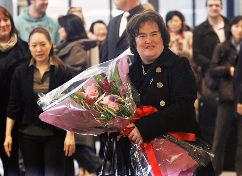 Since her ascent to fame, Susan Boyle has performed internationally. Pictured here at the Narita International Airport ahead of her appearance for a New Year's program on Japanese television in 2009.