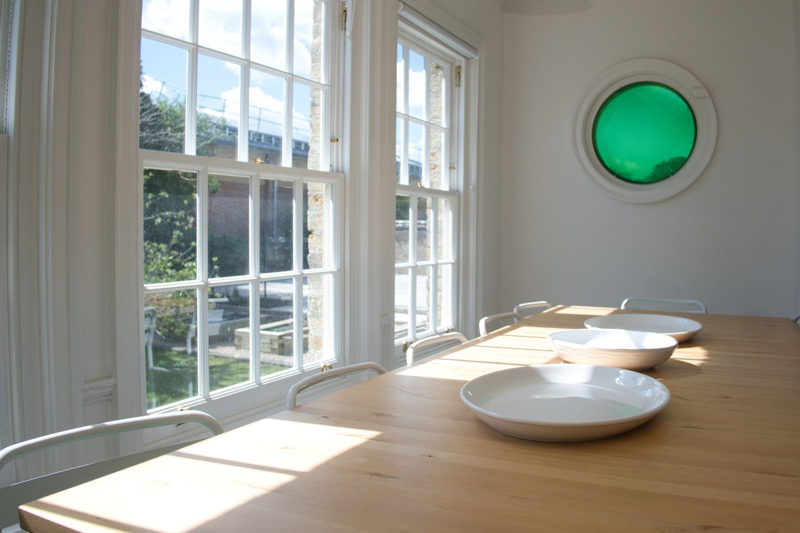 Image may contain Window French Window Chair Furniture Plate Desk Table Roundel Makers House Ramsgate Polly Powell and...