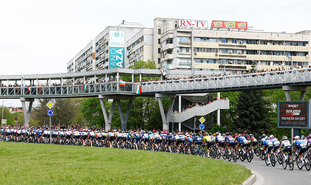 The pack rides during the 2nd stage of the Giro d'Italia 2026 - Tour of Italy cycling race between Burgas and Veliko Tarnovo, Bulgaria, on May 9, 2026. (Photo by Luca Bettini / AFP)