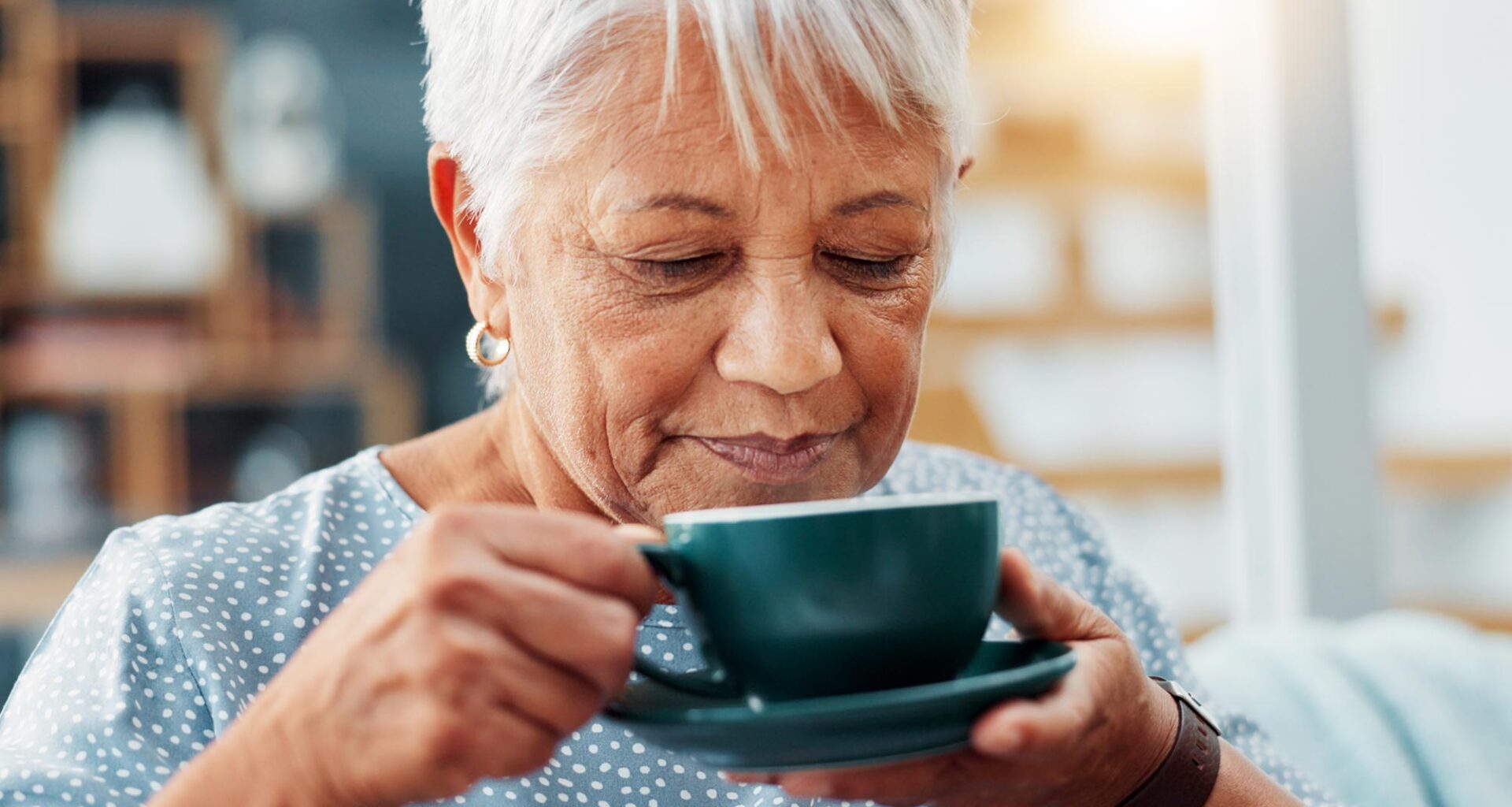 Calm Senior Woman Drinking Coffee Tea