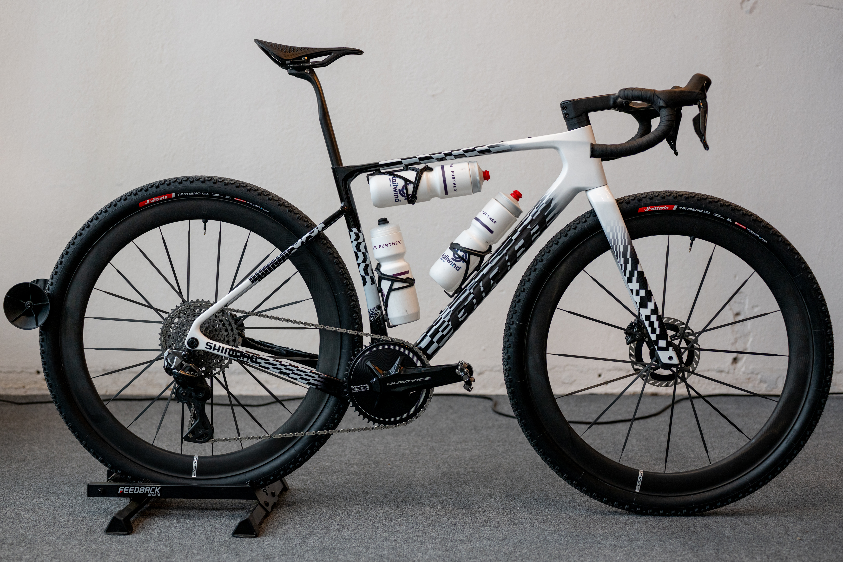 A side view of the bike carrying three bottles - an additional mount under the top tube