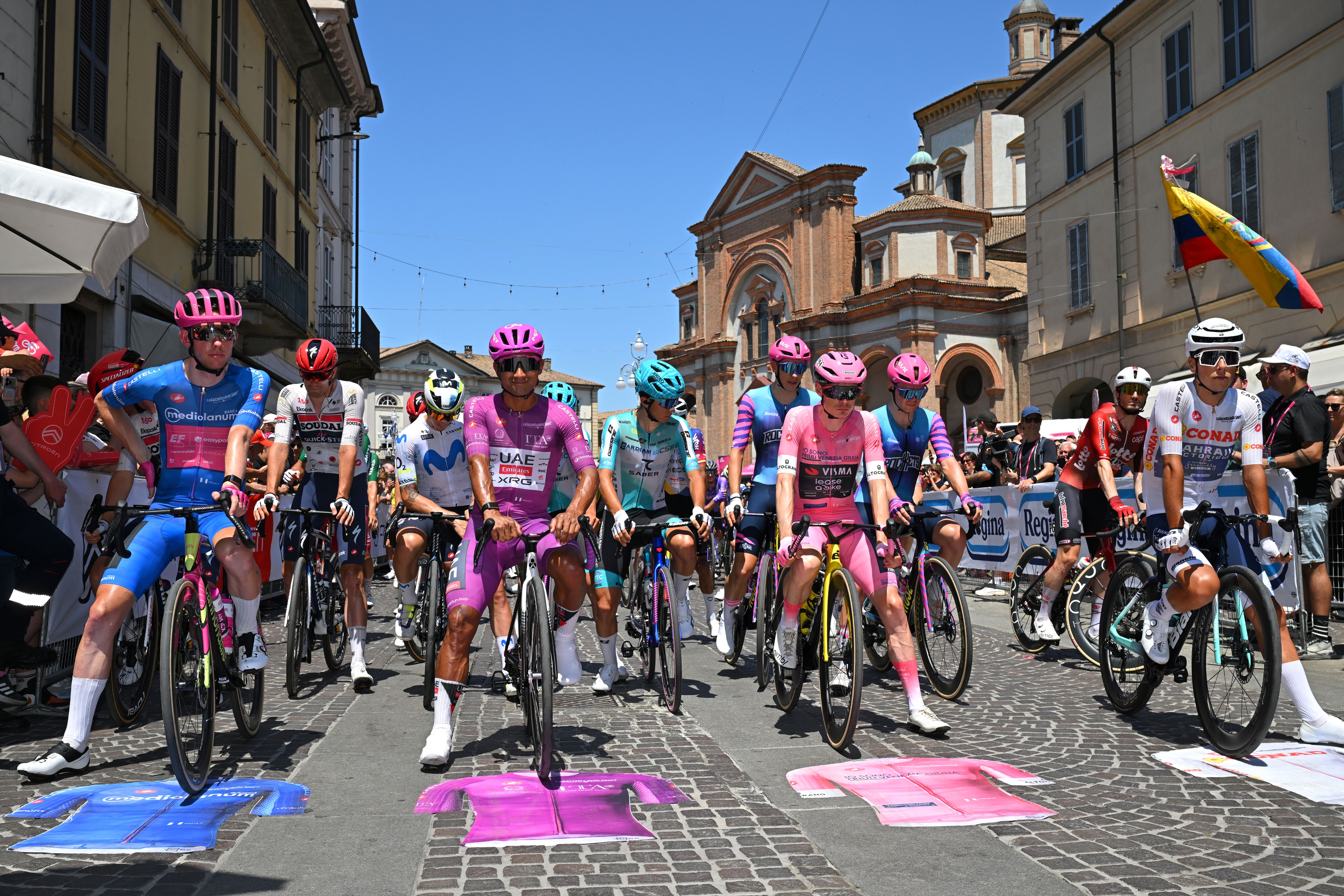 VOGHERA, ITALY - MAY 24: (L-R) Jardi Christiaan van der Lee of Netherlands and Team EF Education - EasyPost, Jhonatan Narvaez of Ecuador and UAE Team Emirates - XRG - Purple Points Jersey, Jonas Vingegaard of Denmark and Team Visma | Lease a Bike - Pink Leader Jersey and Afonso Eulalio of Portugal and Team Bahrain - Victorious - White Best Young Rider Jersey prior to the 109th Giro d'Italia 2026, Stage 15 a 157km stage from Voghera to Milan / #UCIWT / on May 24, 2026 in Voghera, Italy. (Photo by Tim de Waele/Getty Images)