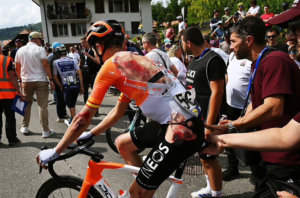 CHARMEY, SWITZERLAND - MAY 02: (EDITORS NOTE: Image depicts death; Image contains graphic content.) Carlos Rodriguez of Spain and Team INEOS Grenadiers after being involved in a crash reacts after the 79th Tour de Romandie 2026, Stage 4 a 149.6km stage from Broc to Charmey / #UCIWT / on May 02, 2026 in Charmey, Switzerland. (Photo by Dario Belingheri/Getty Images)