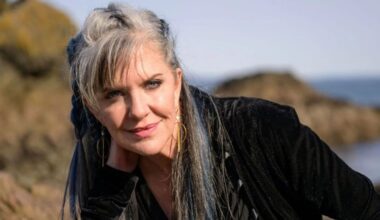 Headshot of actor Jennifer Hale in coastal environ.