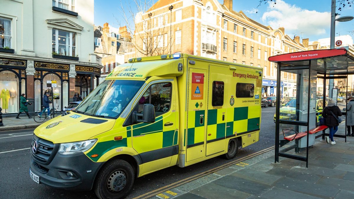 Emergency ambulance on city street in London, UK - stock photo