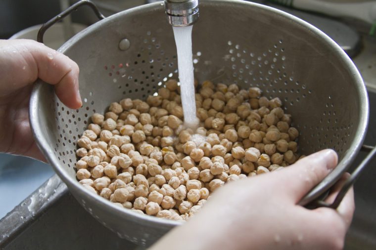 Washing Garbanzon Beans - stock photo