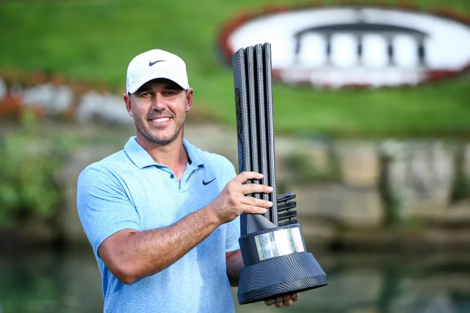 WHITE SULPHUR SPRINGS, WEST VIRGINIA - AUGUST 18: Brooks Koepka of the United States holds the trophy after winning the tournament during day three of LIV Golf: Greenbrier at The Old White Course on August 18, 2024 in White Sulphur Springs, West Virginia. (Photo by Isaiah Vazquez/Getty Images)