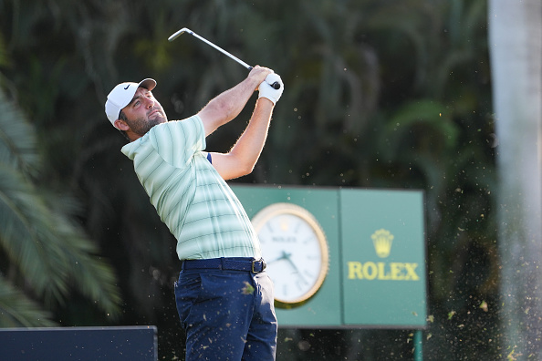 Scottie Scheffler plays a tee shot, on the 16th hole at the Cadillac Championship at Trump National Doral