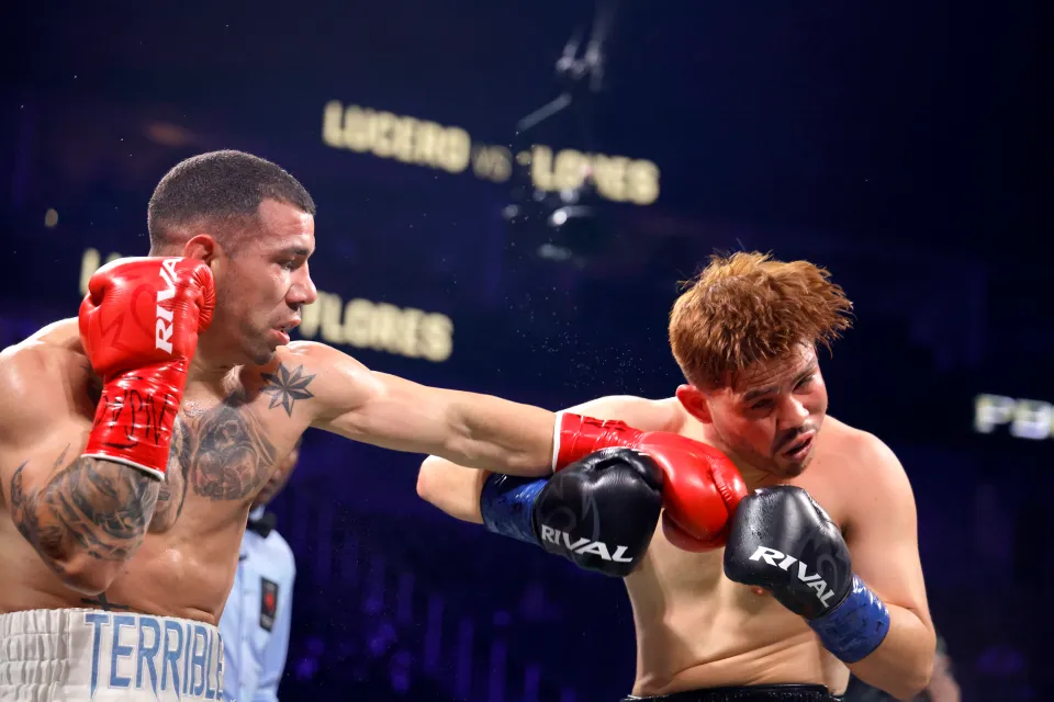 Ismael Flores landing a punch on Isaac Lucero