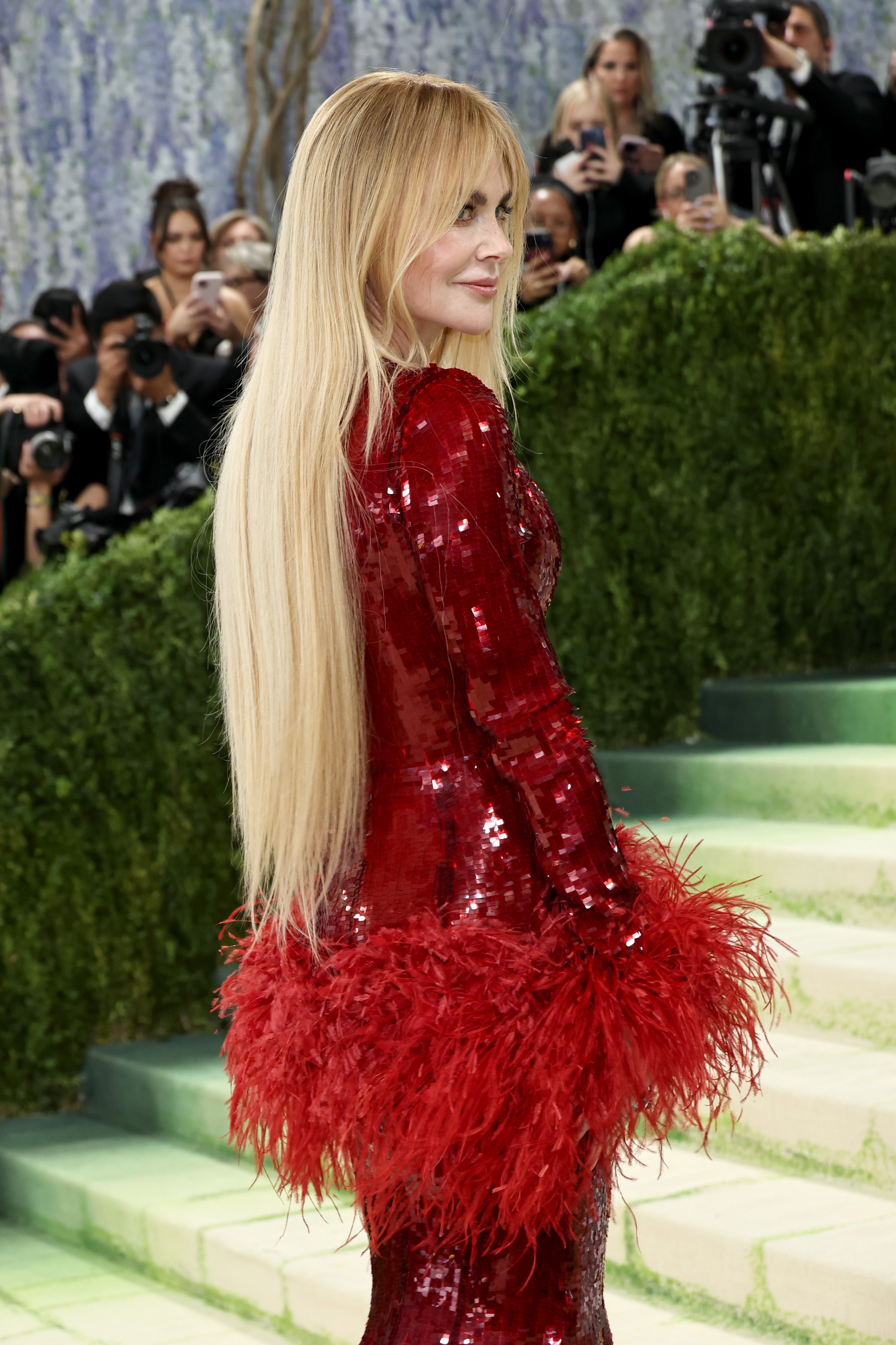 The actor’s dress was finished with fluffy, Mongolian wool cuffs