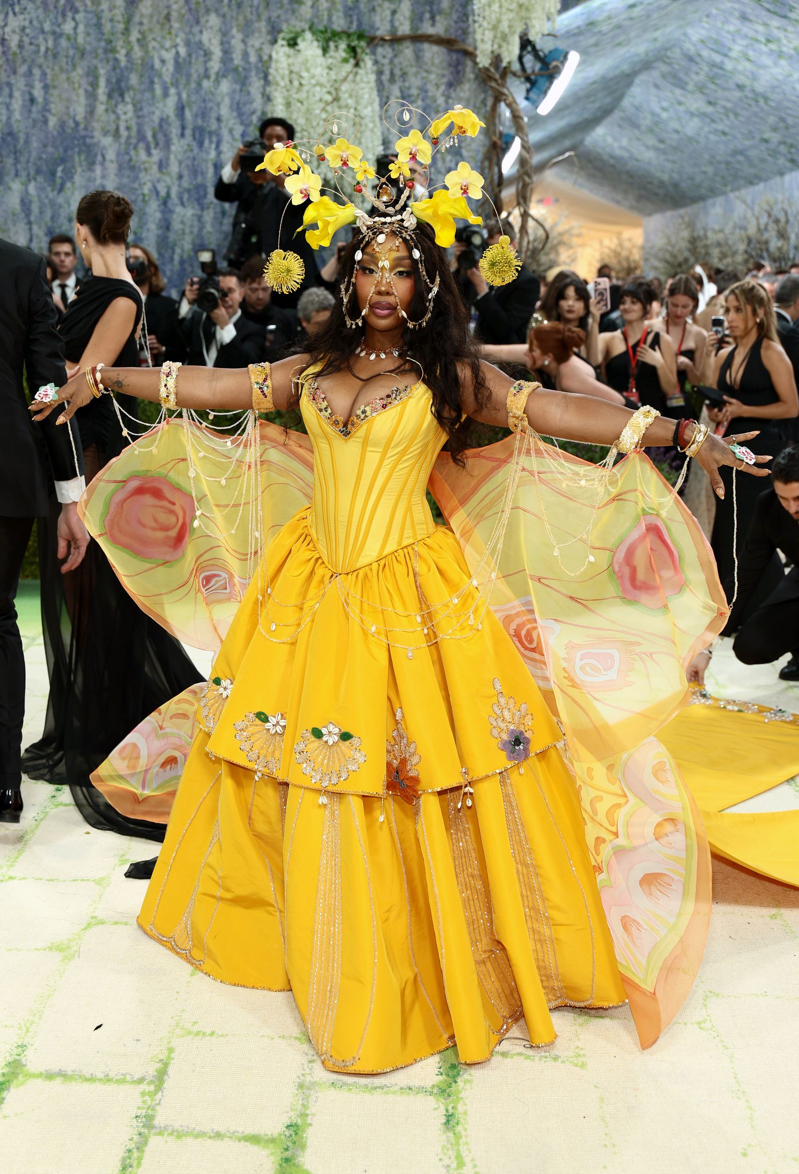 Image may contain SZA Dancing Leisure Activities Person Clothing Costume Adult Wedding Formal Wear and Suit