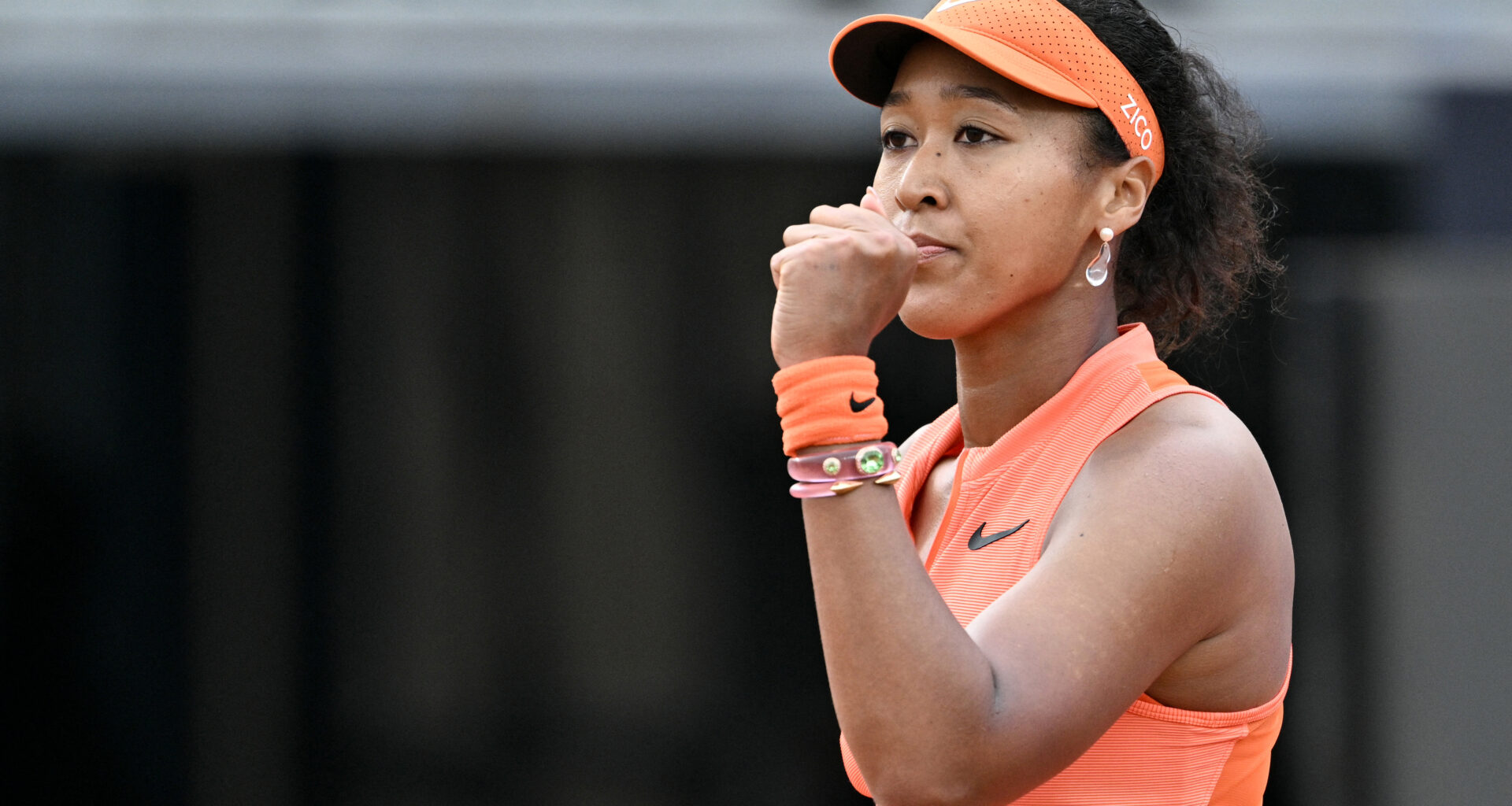 Osaka regroups against inspired Lys to reach Rome third round