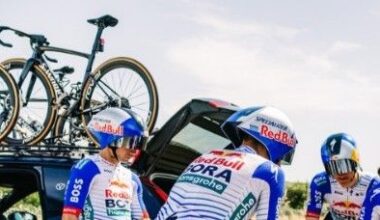 An unknown black Specialized bike atop a team car