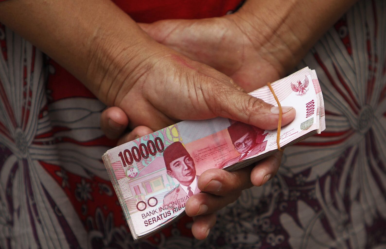 The leakage and lies keeping Indonesia's rupiah weak