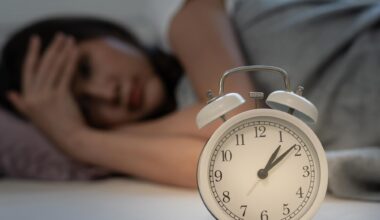 Insomnia Asian Woman in Bed Late Trying to Sleep