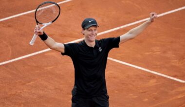 Jannik Sinner celebrates winning a clay court tournament in 2026
