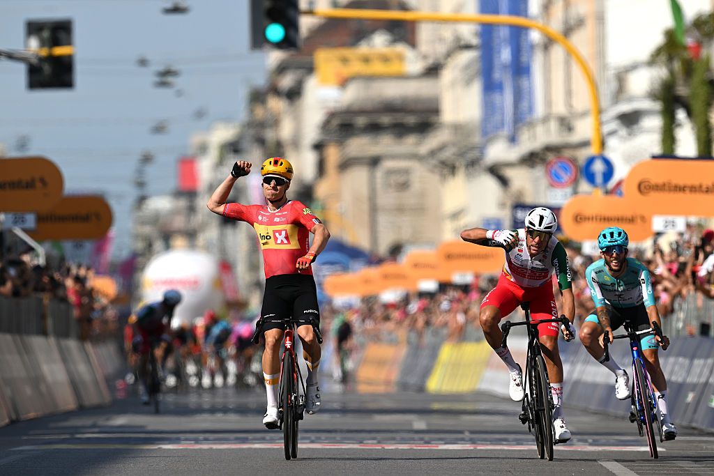 MILAN, ITALY - MAY 24: (L-R) Fredrik Dversnes Lavik of Norway and Team Uno-X Mobility celebrates at finish line as stage winner ahead of Mirco Maestri of Italy and Team Polti VisitMalta and Martin Marcellusi of Italy and Team Bardiani CSF 7 Saber during the 109th Giro d&amp;apos;Italia 2026, Stage 15 a 157km stage from Voghera to Milan / #UCIWT / on May 24, 2026 in Milan, Italy. (Photo by Tim de Waele/Getty Images)