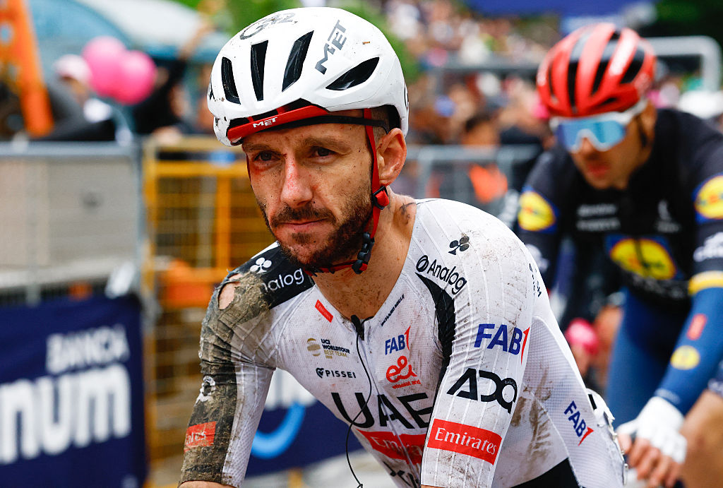 UAE Team Emirates - XRG British rider Adam Yates crossing the finish line after a crash in the 2nd stage of the Giro d'Italia 2026 - Tour of Italy cycling race between Burgas and Veliko Tarnovo, Bulgaria, on May 9, 2026. (Photo by Luca Bettini / AFP)