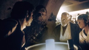 STAR WARS, (aka STAR WARS: EPISODE IV - A NEW HOPE), from left: Harrison Ford, Peter Mayhew, Alec Guinness, Mark Hamill, 1977. ©LucasFilm Ltd./Courtesy Everett Collection (image upgraded to 17.7 x 12 in)